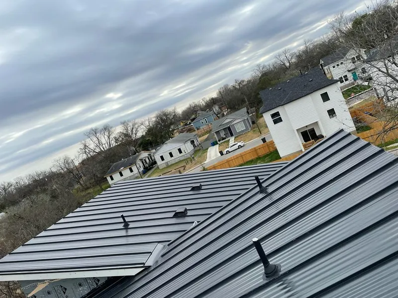 Standing seam metal roof panels with vents for Skylight Repair in Saddlebrooke